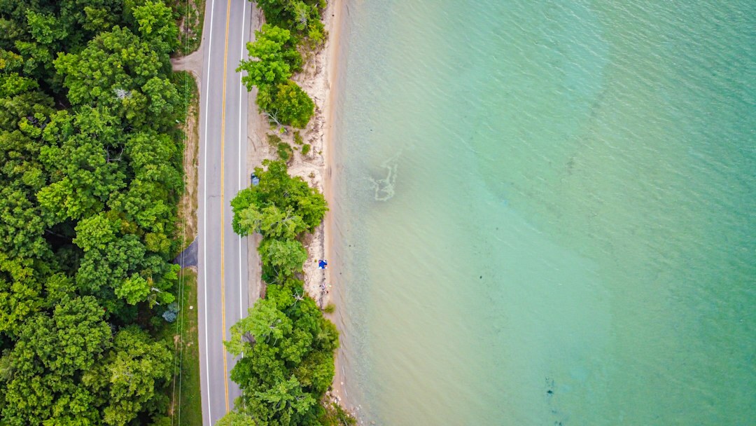 Aerial view of a peninsula city coastline with beaches on both sides