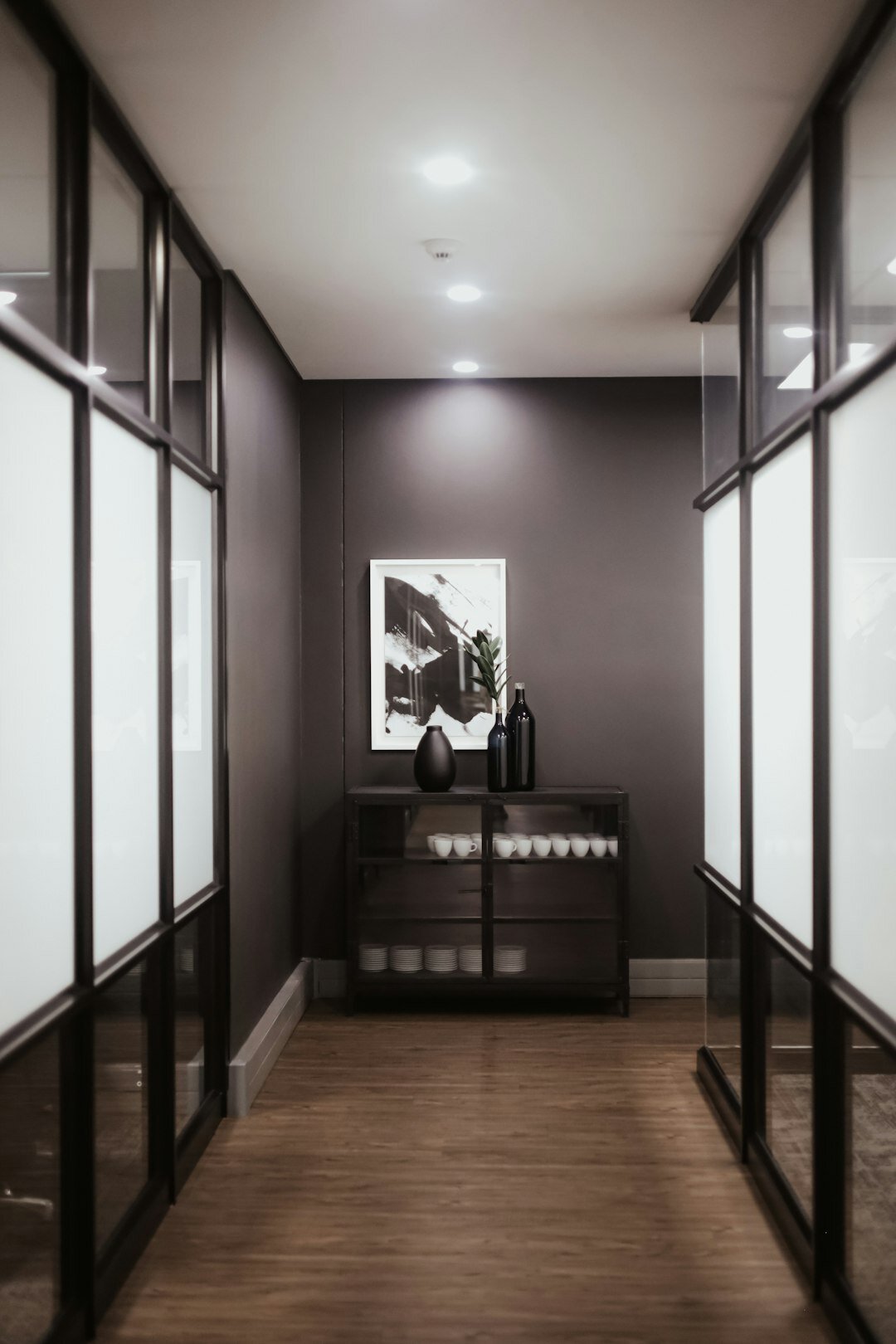 Minimalist boutique office lounge with linen furniture and natural light